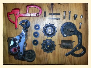 The parts that make up a derailleur laid out